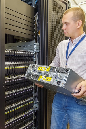 4-REPLACEMENTS-UPGRADES_Tech Installing Server_49538085_s.jpg