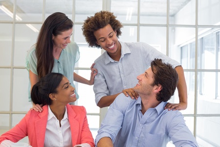 Excellent employees and management congratulating each other IT services Tech Service Today