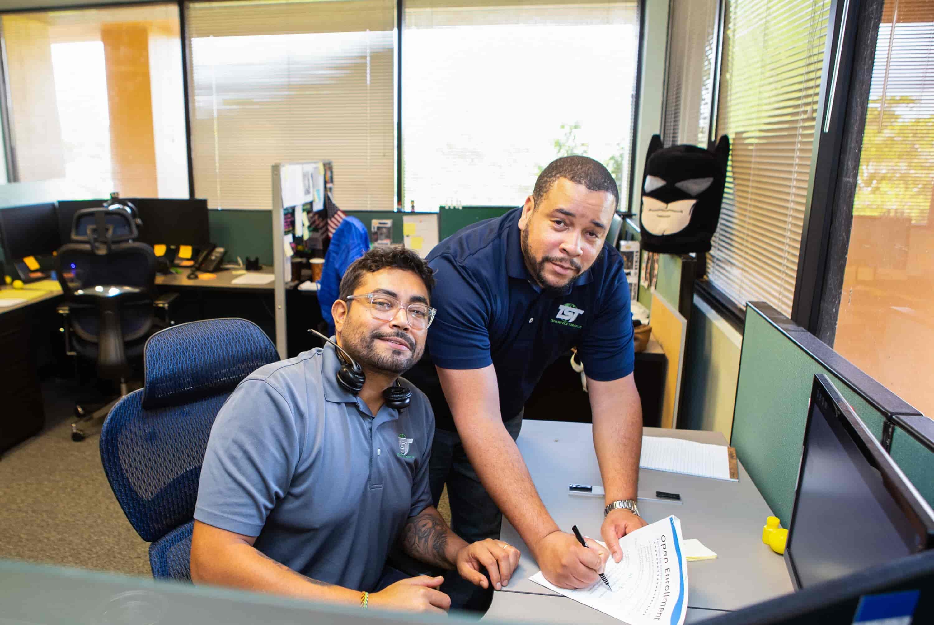 Ed & Isaac at the office desk